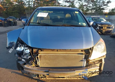 2009 Honda Odyssey Ex-L from USA, damaged, VIN 5FNRL387X9B016061